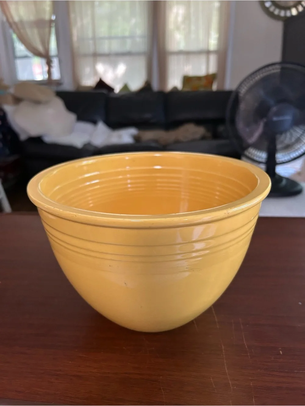 Vintage fiestaware yellow mixing bowl two chips on the rim, 8 3/4”wide x 6 1/2”